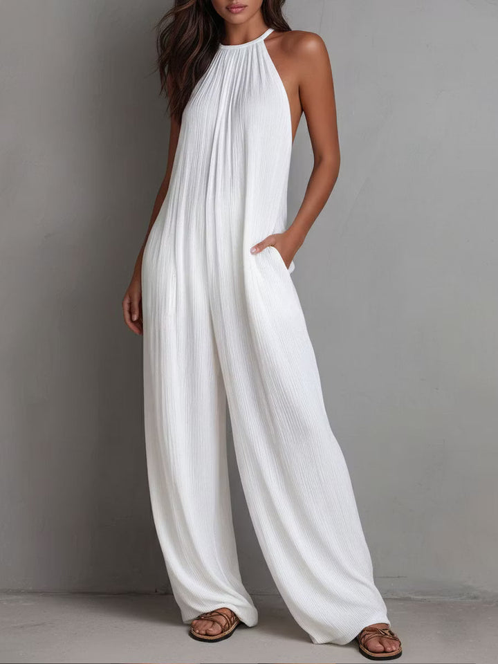 White Pleated Resort Jumpsuit with Halter Neck and Wide Legs