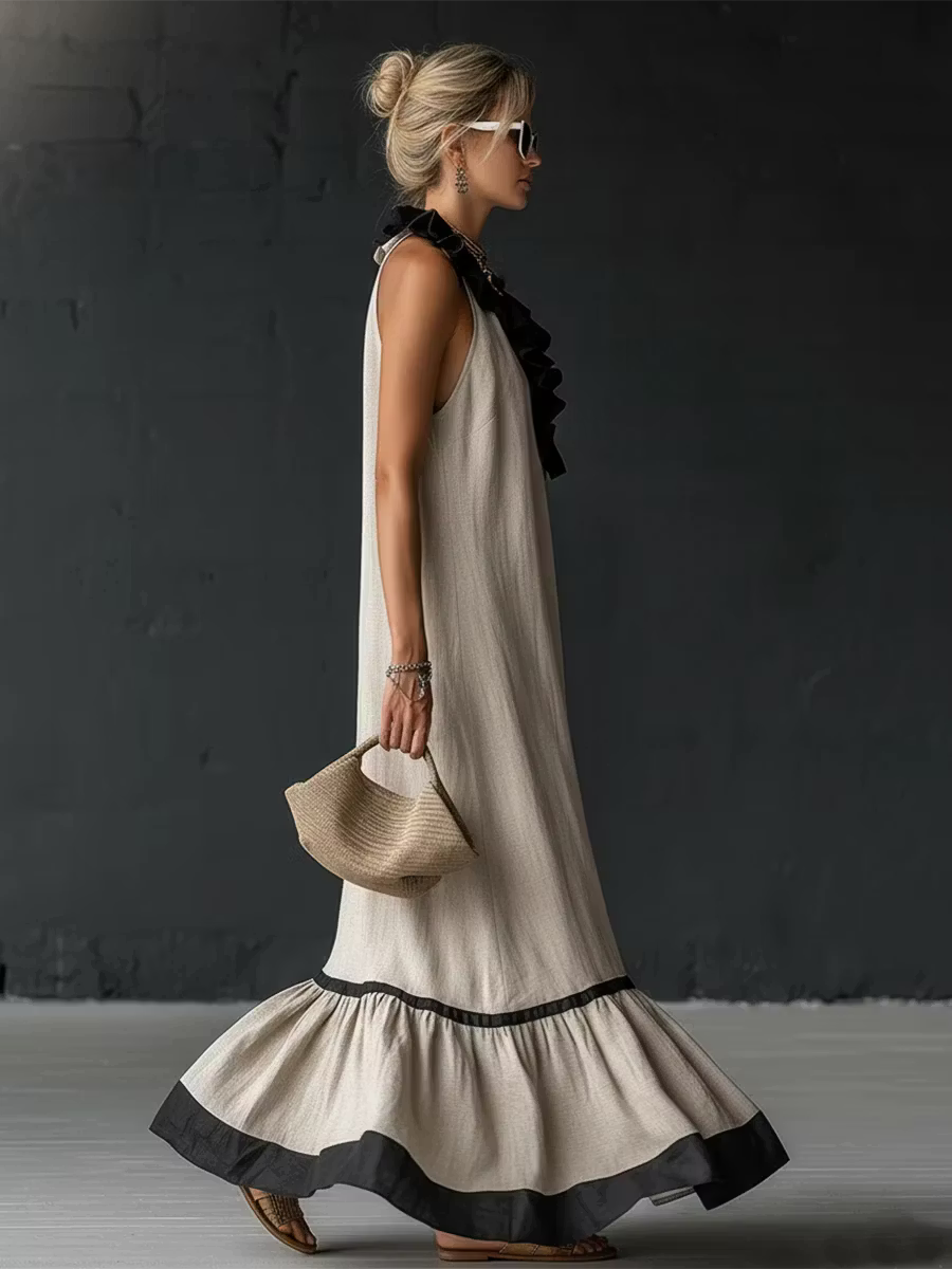 Elegant and romantic long dress with ruffles and color blocks.