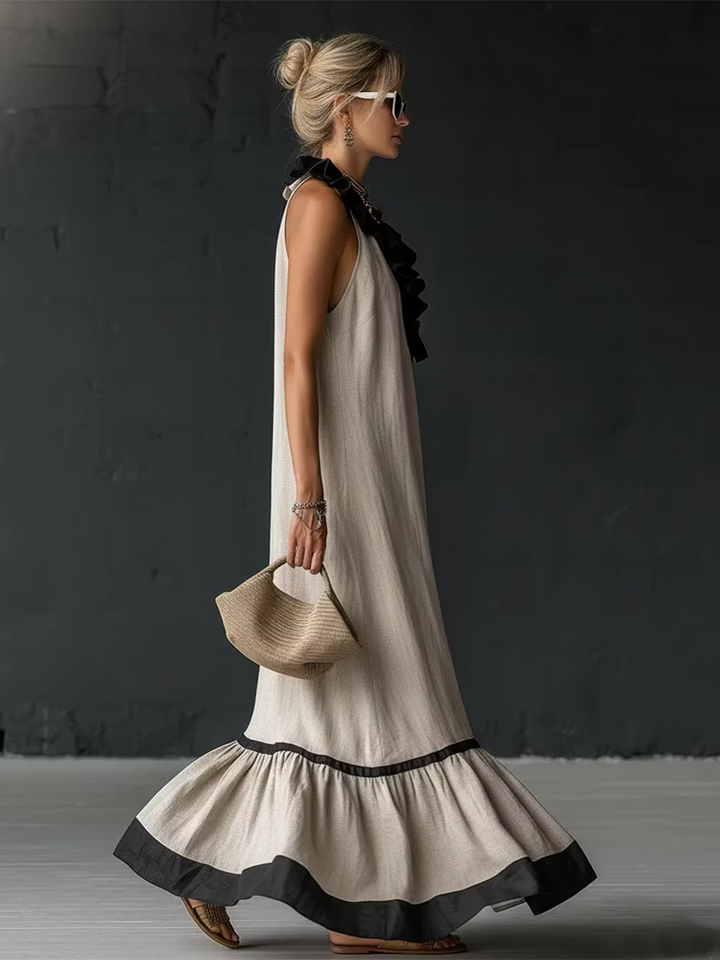 Elegant and romantic long dress with ruffles and color blocks.