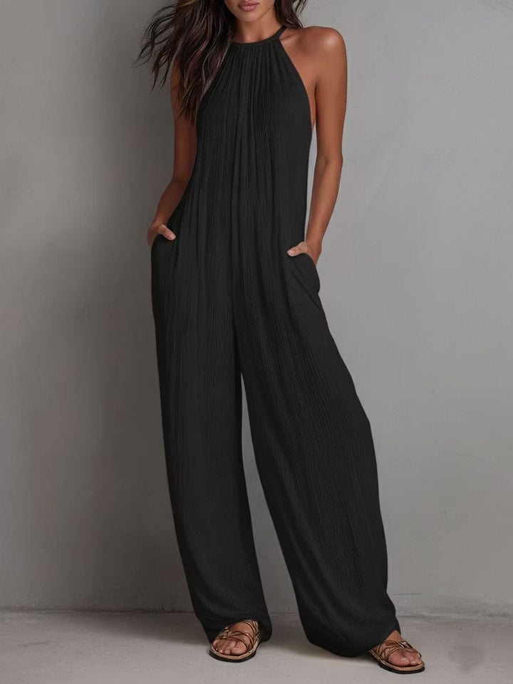 White Pleated Resort Jumpsuit with Halter Neck and Wide Legs