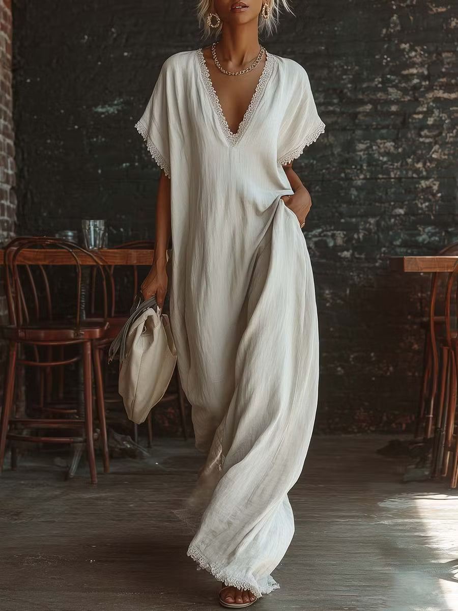 Elegant and cozy long dress made of linen and cotton with lace details.