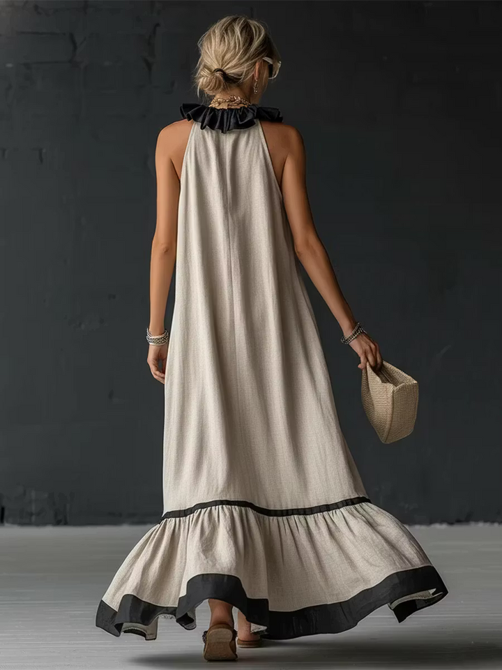 Elegant and romantic long dress with ruffles and color blocks.