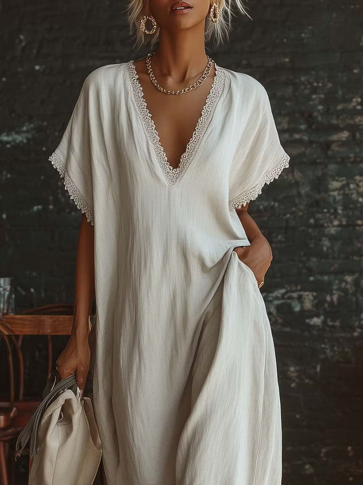 Elegant and cozy long dress made of linen and cotton with lace details.