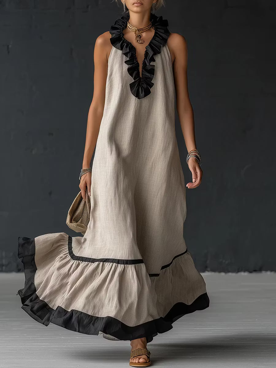 Elegant and romantic long dress with ruffles and color blocks.
