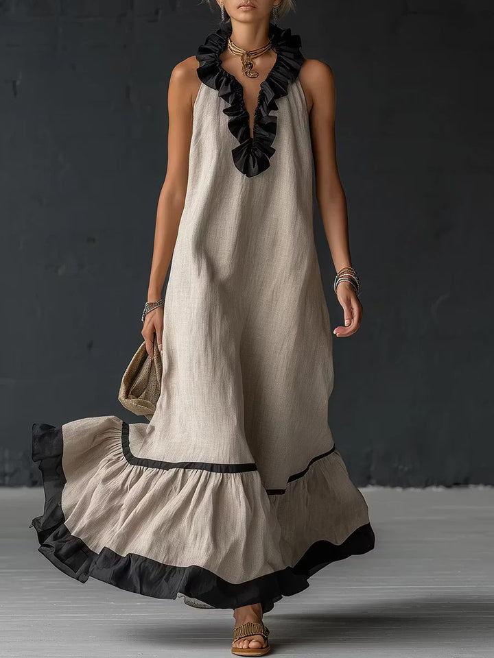 Elegant and romantic long dress with ruffles and color blocks.