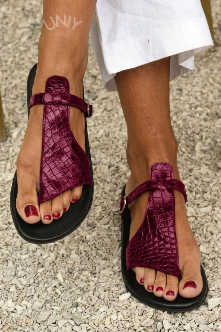 Crocodile effect thong sandals with strap and buckle on the instep