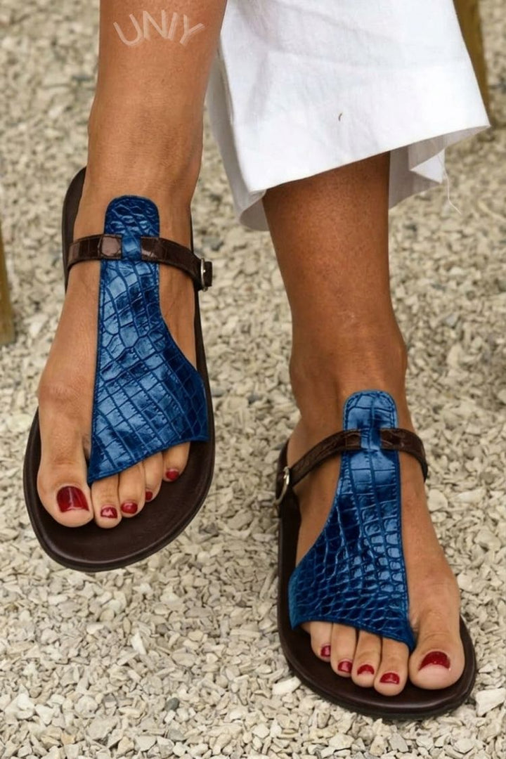 Crocodile effect thong sandals with strap and buckle on the instep