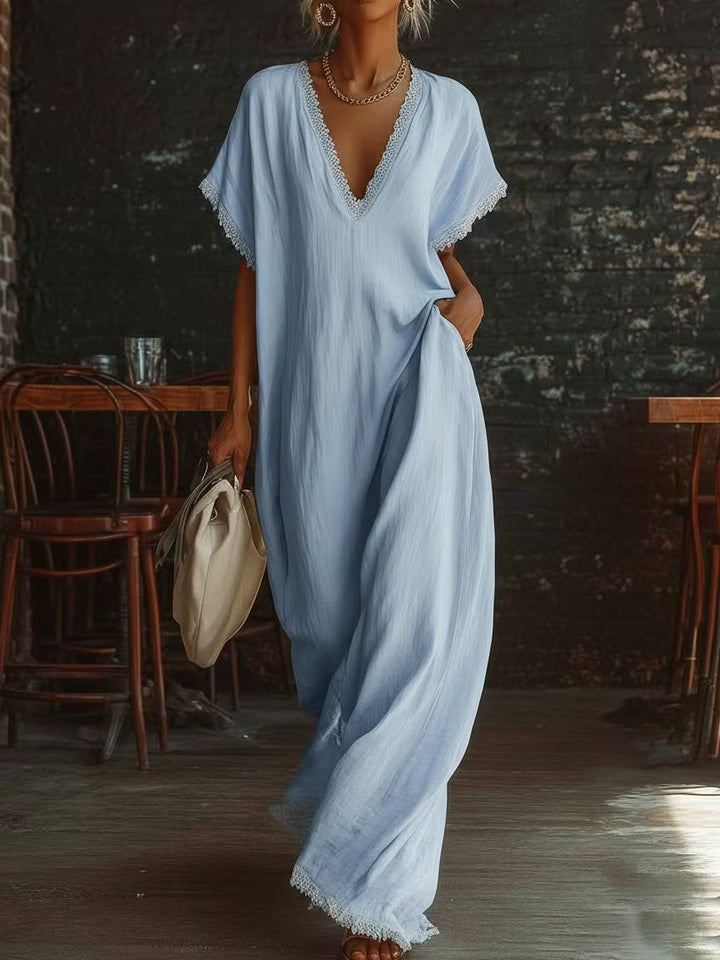 Elegant and cozy long dress made of linen and cotton with lace details.