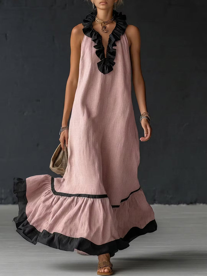 Elegant and romantic long dress with ruffles and color blocks.