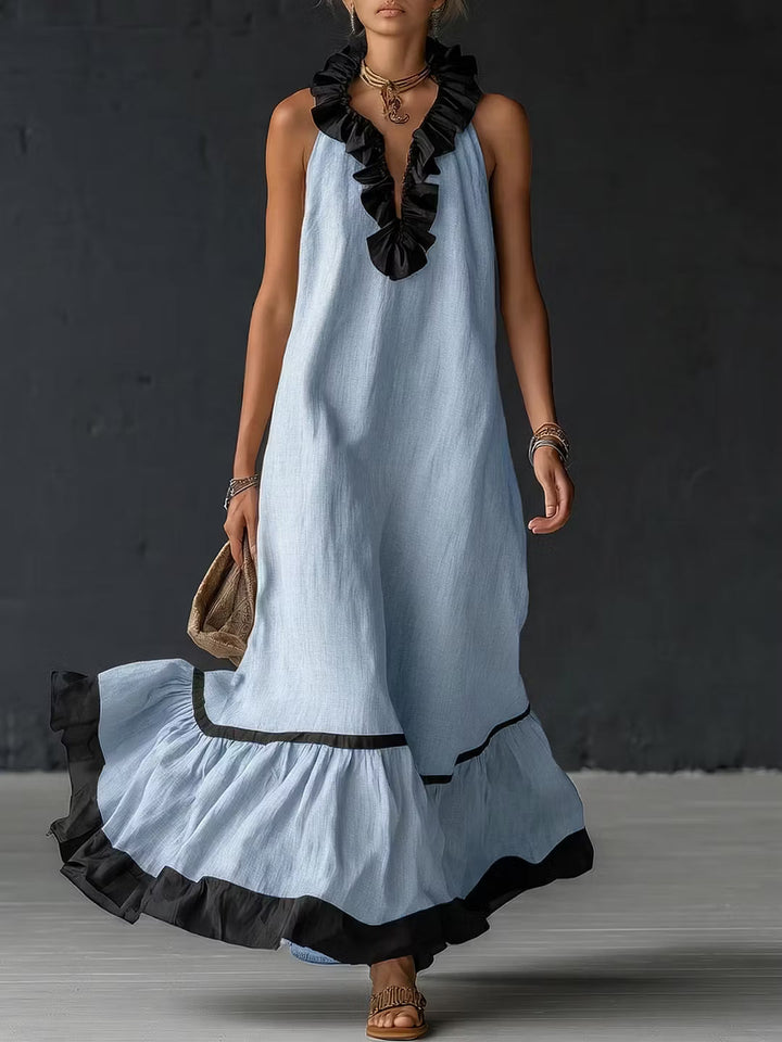 Elegant and romantic long dress with ruffles and color blocks.