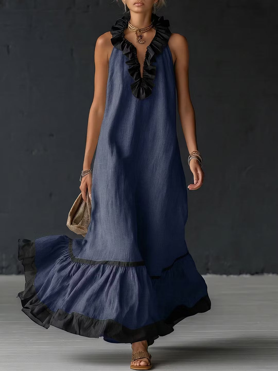 Elegant and romantic long dress with ruffles and color blocks.
