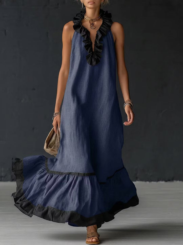 Elegant and romantic long dress with ruffles and color blocks.